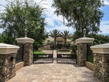 Front gate and paver driveway - manor home - Ormond Beach Florida