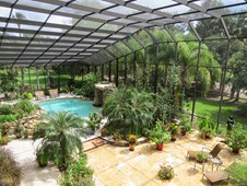 Pool enclosure and landscaping - manor home - Ormond Beach FL