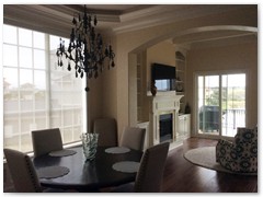 Dining area and fire place - Palm Coast custom home