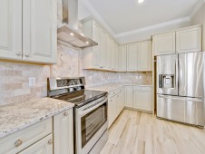 Close-up of kitchen and custom backsplash