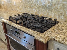 Gas cooktop and granite countertops  - manor home - Ormond Beach FL