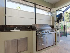 Outdoor kitchen - narrow lot home -Flagler Beach Florida